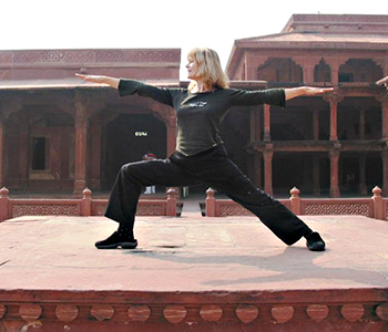 Jenny Otto in India in Virabhadrasana II / Warrior II Pose